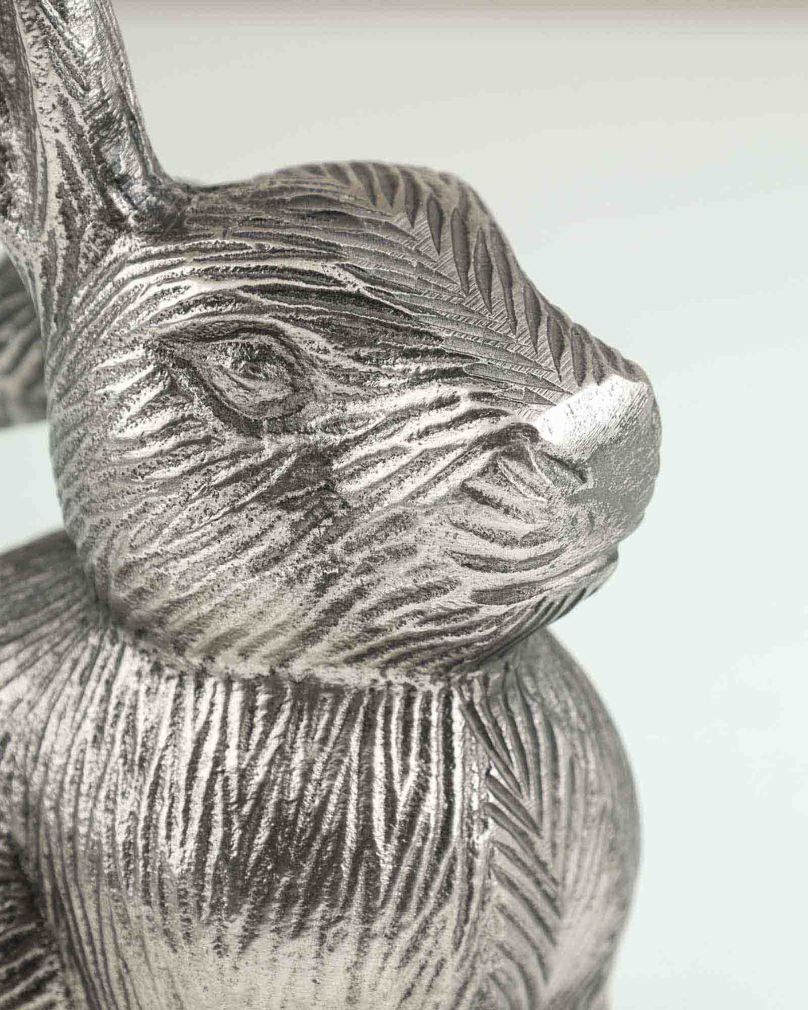 Conejo Ant. Silver Table Decor in antique silver finish placed on a tabletop