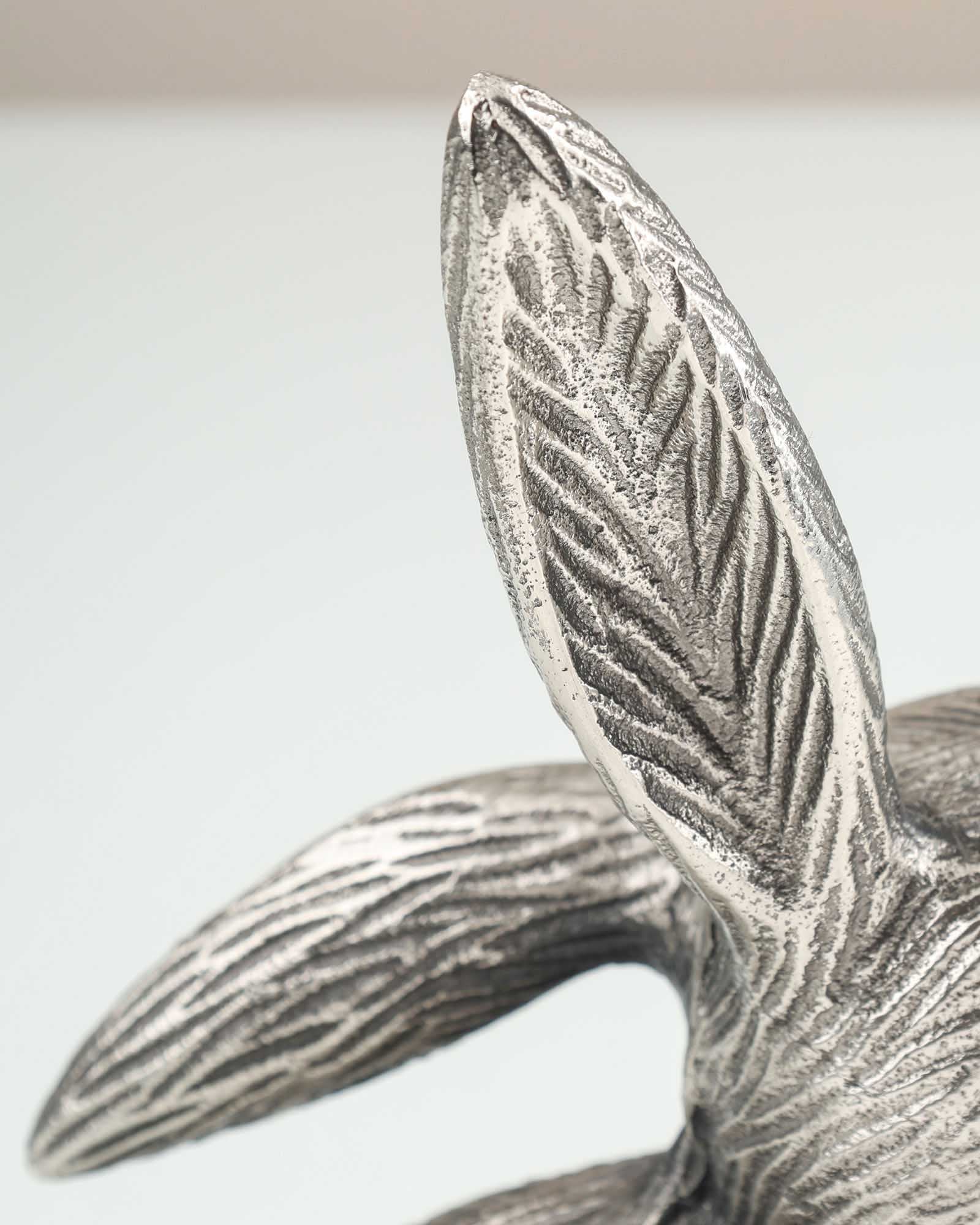 Conejo Ant. Silver Table Decor in antique silver finish placed on a tabletop