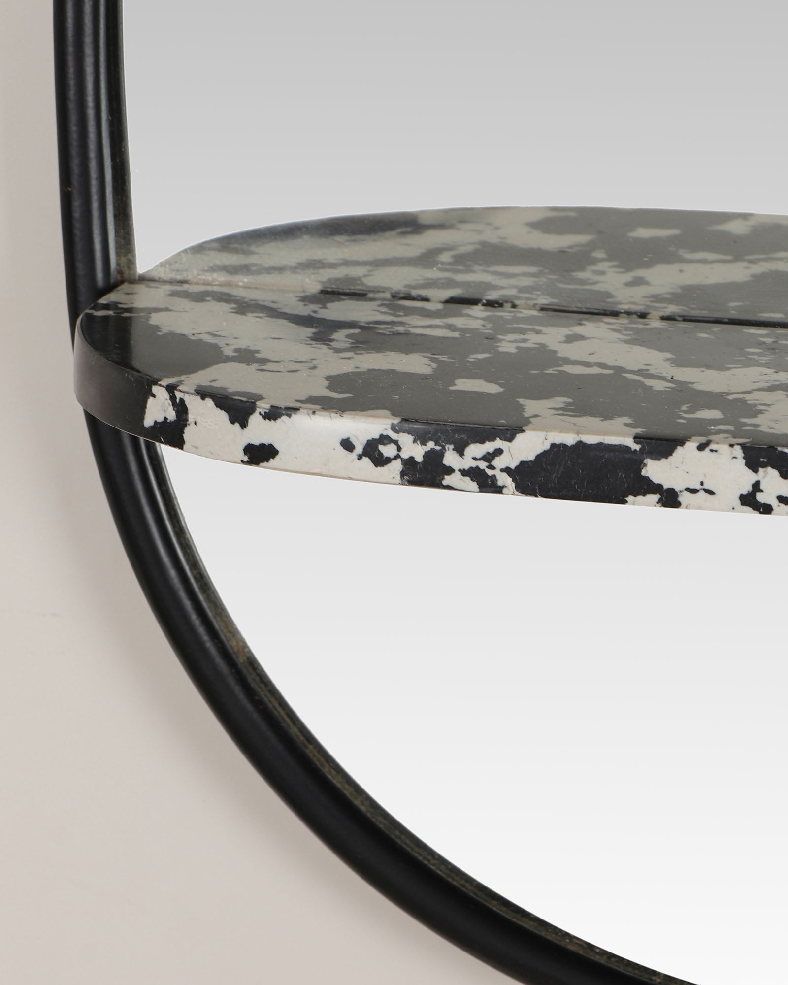 Modern wall mirror with built-in shelf for décor and essentials.