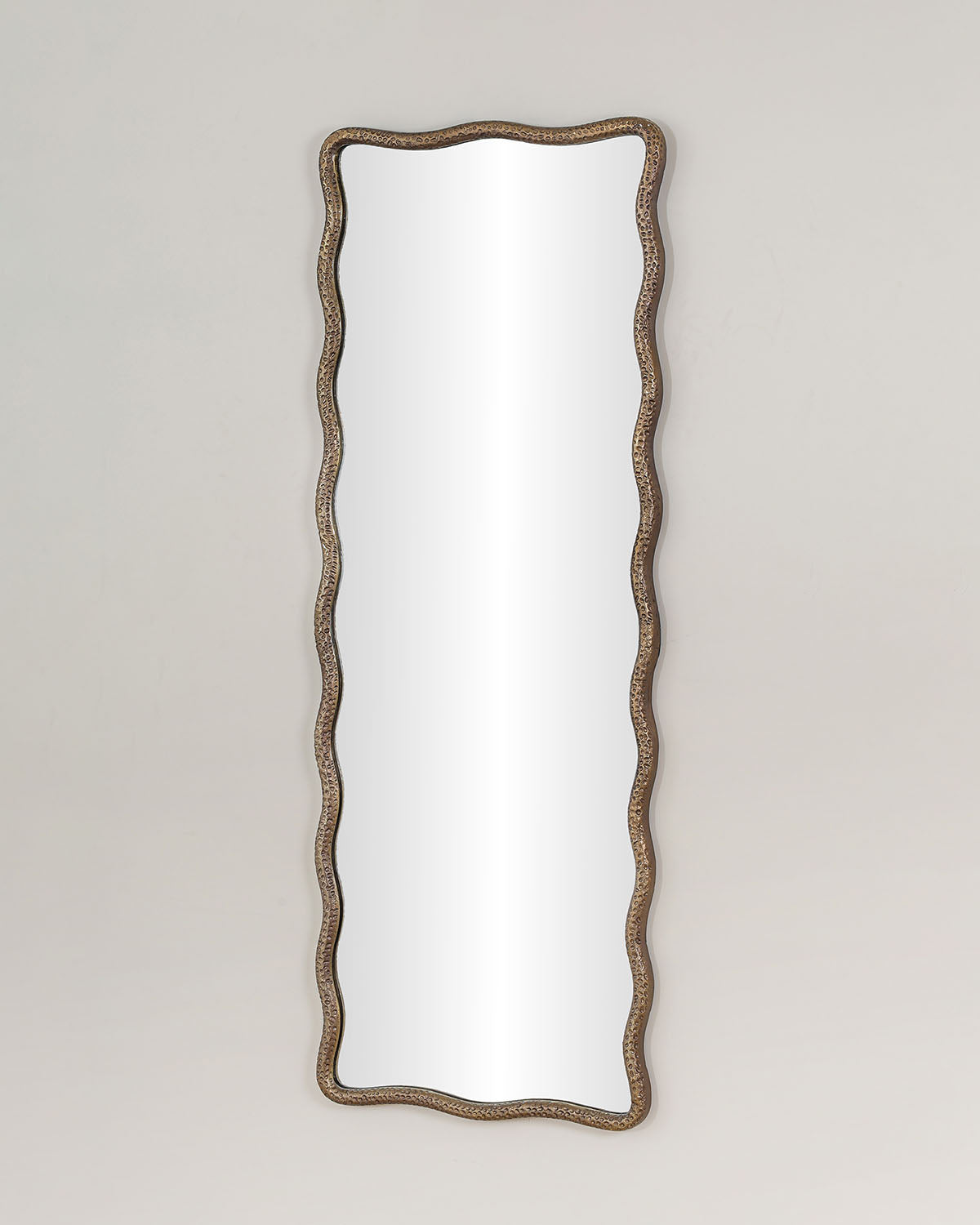 Luxury living room mirror crafted in textured antique brass with premium mirror glass.